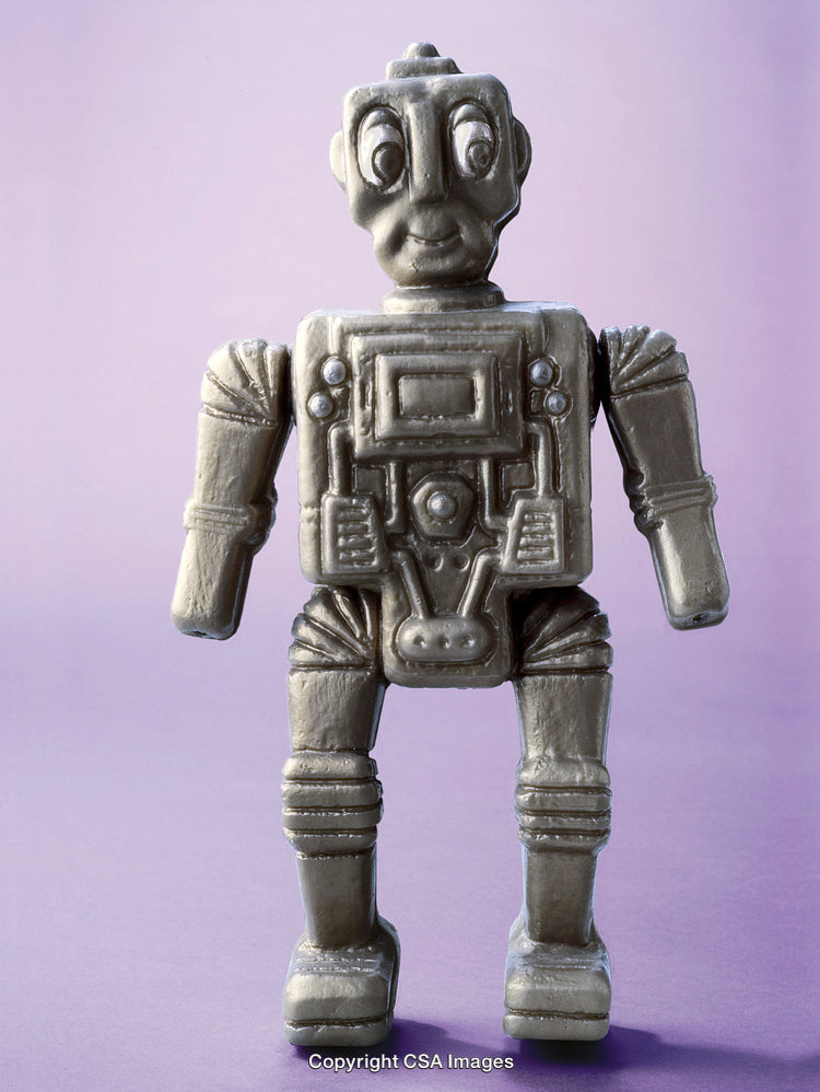 Vintage Robot Toy on a Purple Background Standing Upright