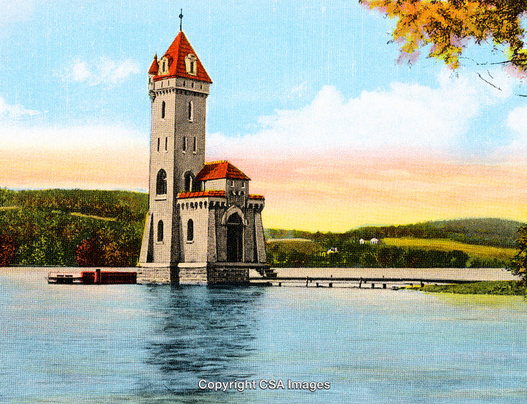 Historic Tower Surrounded by Lake Under a Vibrant Sunset