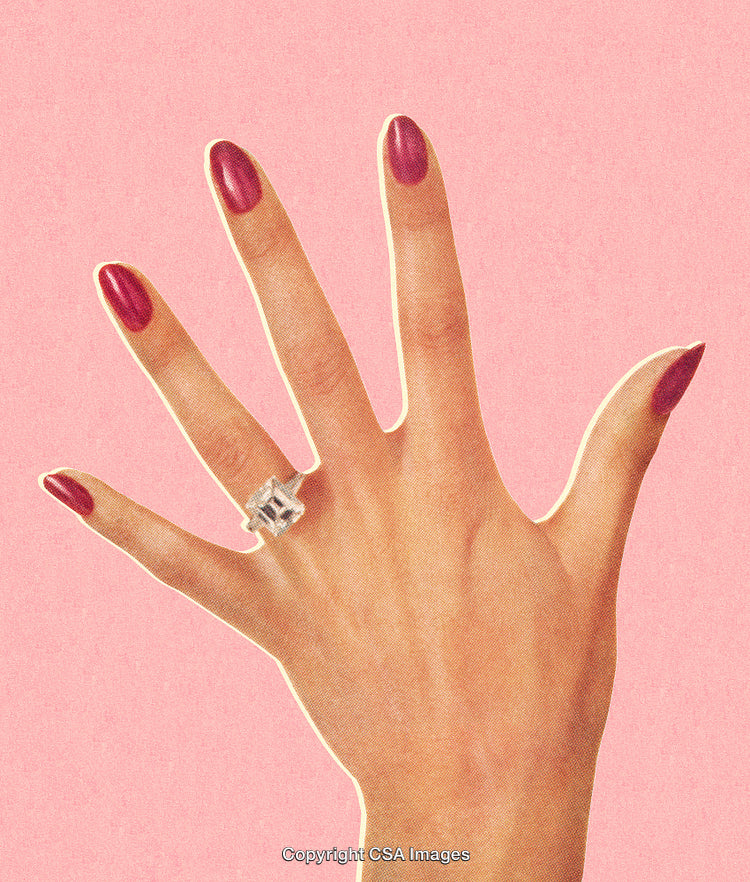 Elegant Hand With Diamond Ring on Pink Background