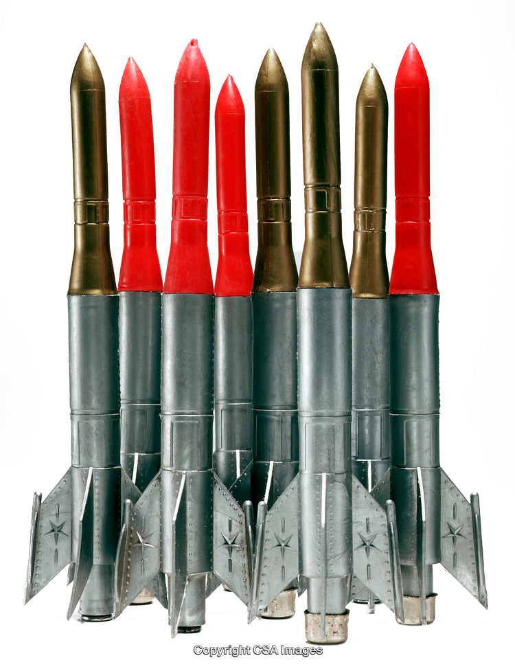 Collection of Red and Gold Toy Rockets With Detailed Metal Bases