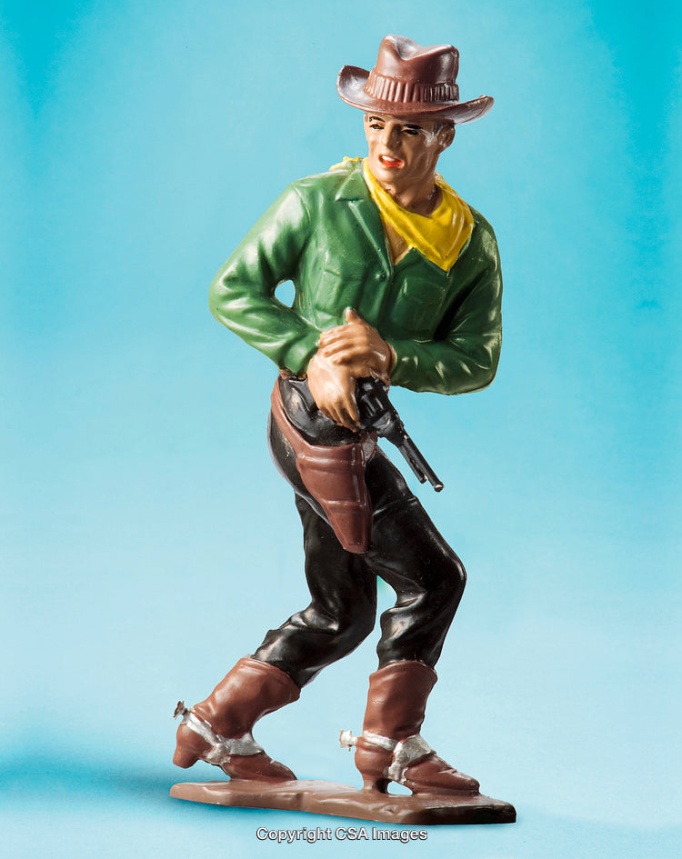 Colorful Cowboy Figurine Against Bright Blue Background for Western Collection