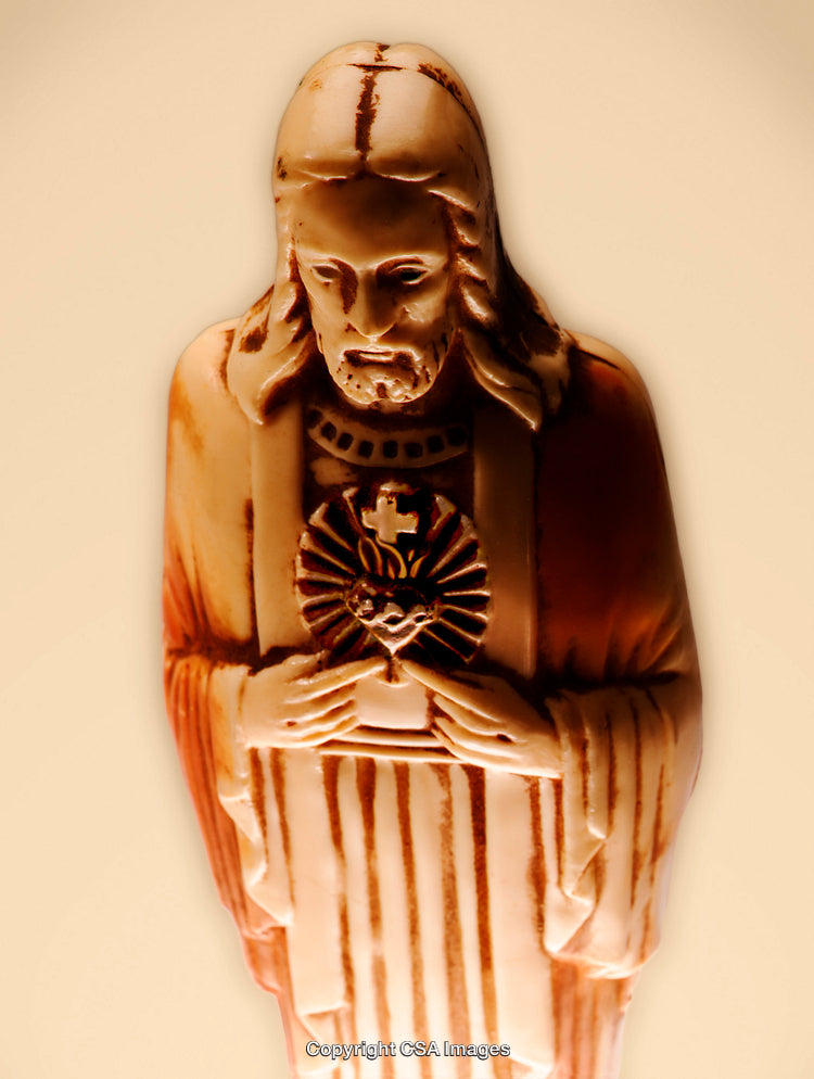 Figurine Representation of Religious Sacred Heart with Warm Light and Detail