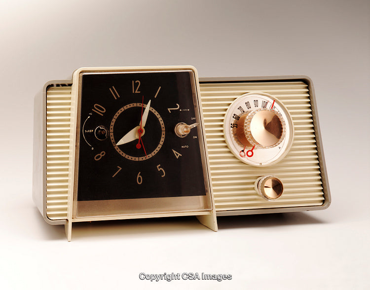 Vintage Retro Clock Radio With Classic Analog Design and Gold Accents