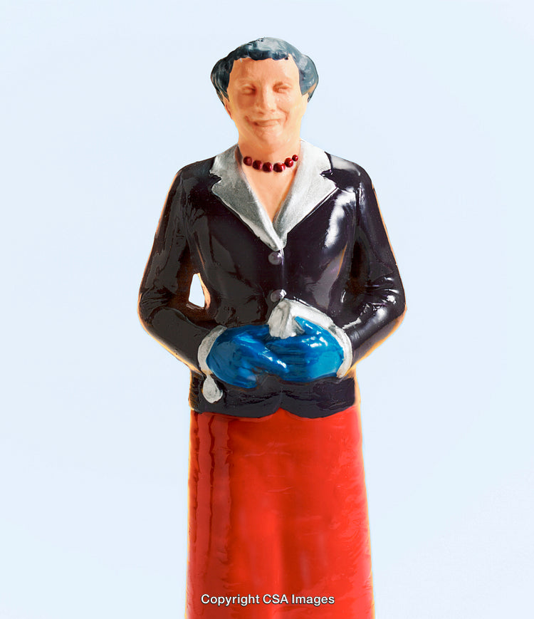 Colorful Figurine of a Woman in a Stylish Outfit