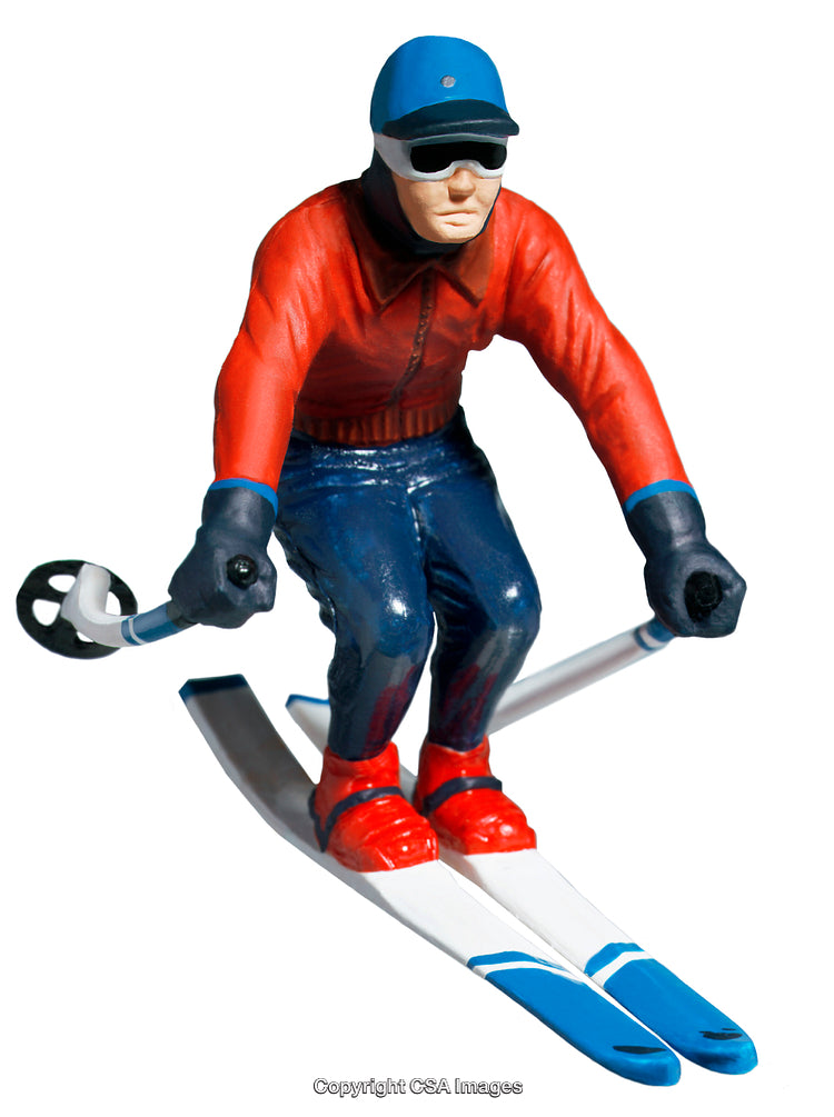 Toy Figure of a Skier Dressed in Red with Blue Skis and Cap