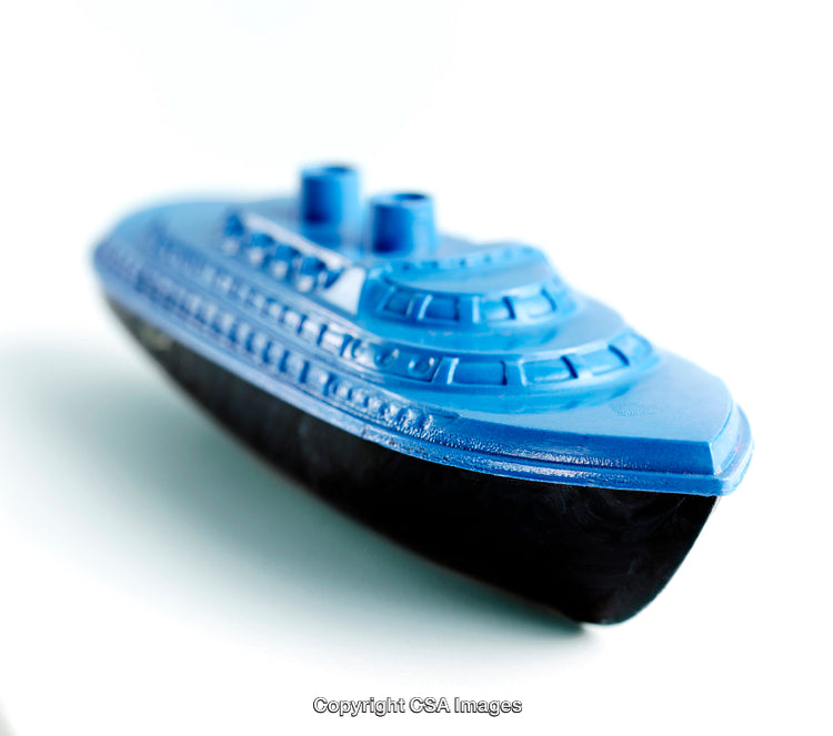 Blue Plastic Toy Ship on a White Background