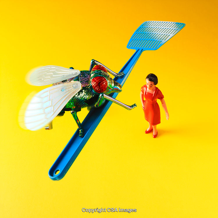 Playful Scene with Toy Fly, Blue Swatter, and Miniature Woman on Yellow