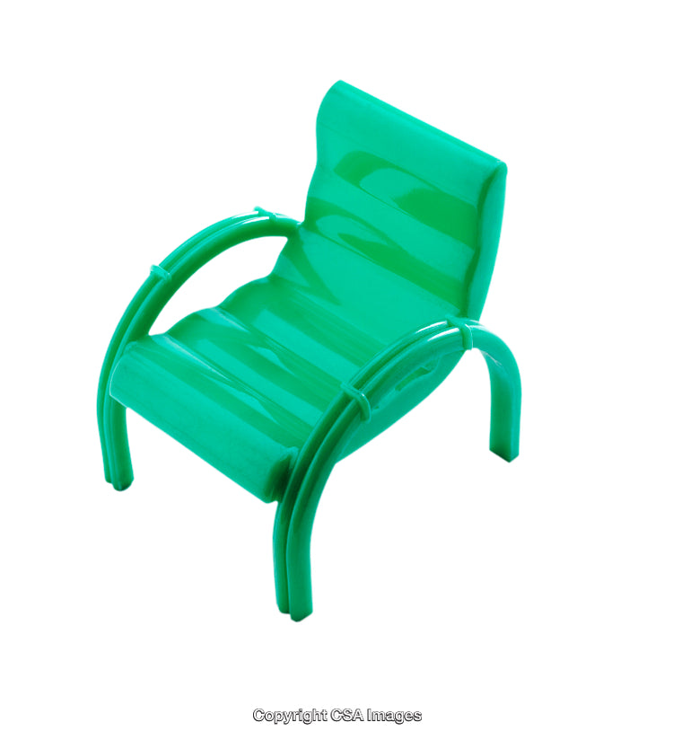 Green Plastic Toy Chair in a Minimalistic Isolated White Background