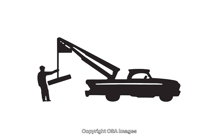Silhouette Illustration of a Tow Truck with Worker in Operation