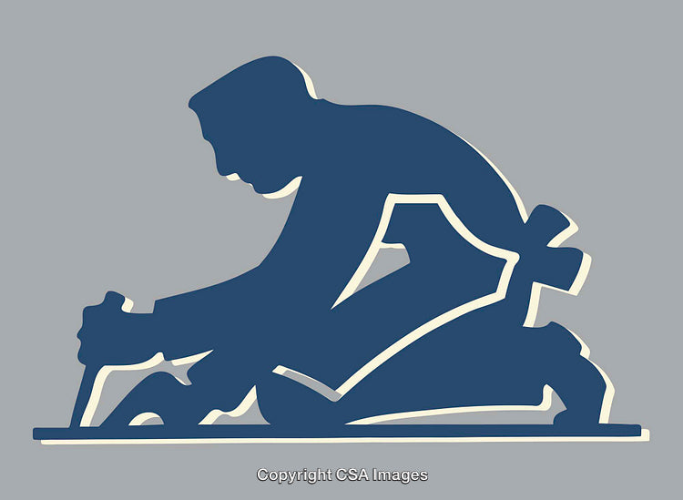 Silhouette of a Craftsman Kneeling with Tool in Hand
