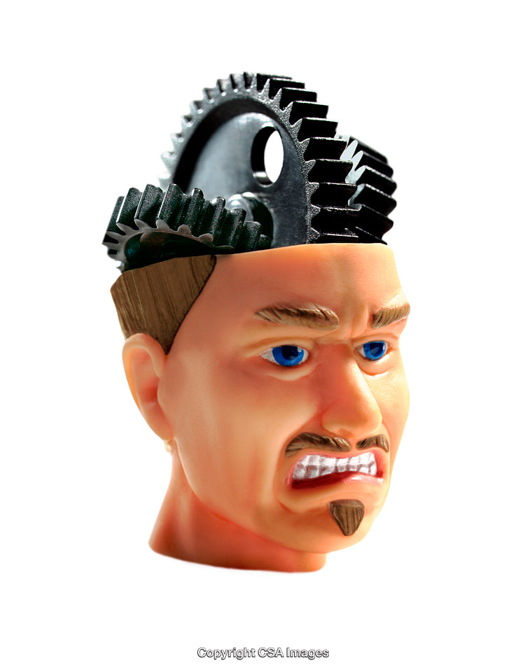 Close-Up of a Toy Featuring Gears and an Angry Expression