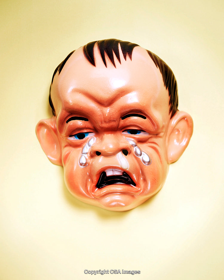 Funny Crying Baby Mask on Pastel Yellow Background