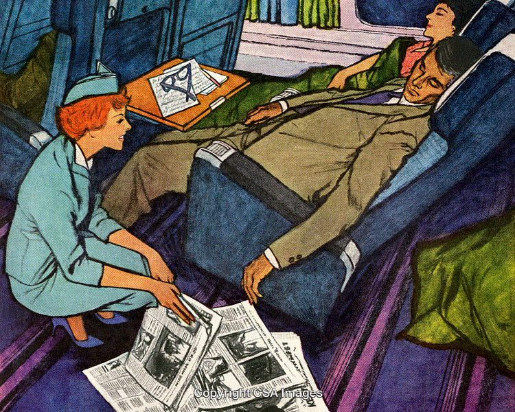 Flight Attendant Assisting Sleeping Passengers In Airplane Cabin