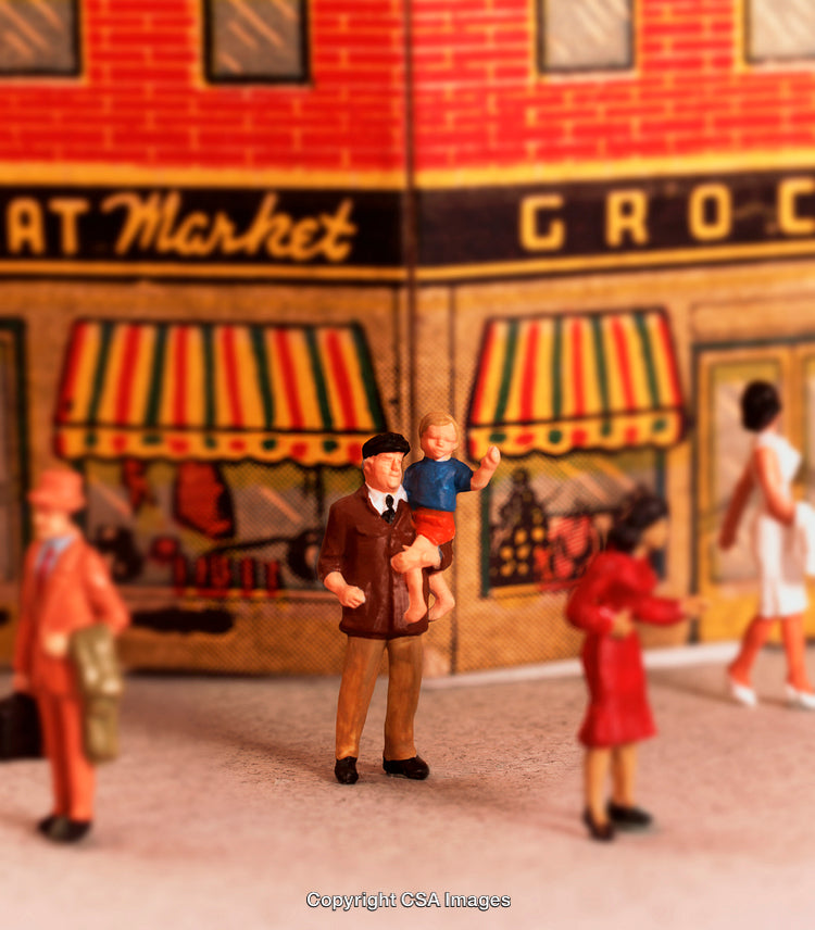 Miniature Figures Depicting Family Scene Outside Market in Urban Setting