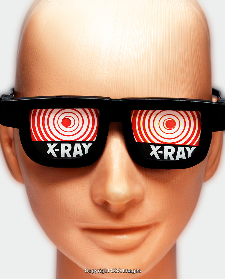 Close-Up of a Mannequin Wearing X-Ray Vision Novelty Glasses with Spiral Patterns