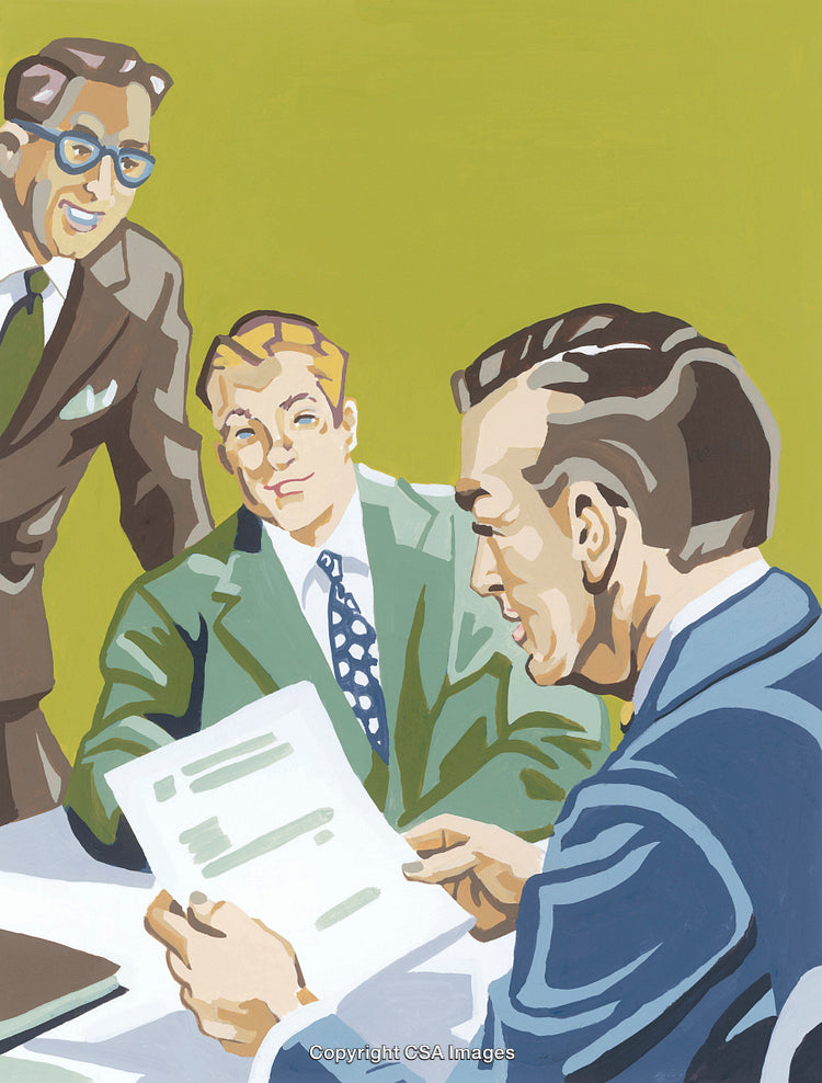 Three Colleagues Reviewing Documents During a Professional Meeting