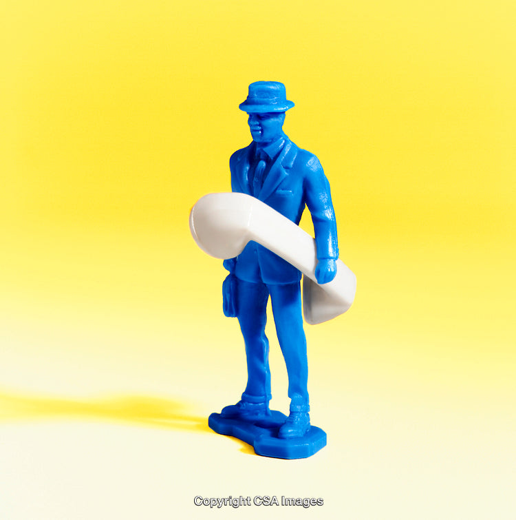 Blue Plastic Toy Figure Holding Oversized Telephone Receiver