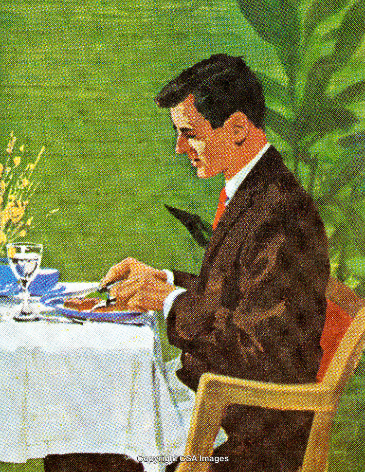 Business Professional Dining Outdoors in a Formal Setting with Greenery Around