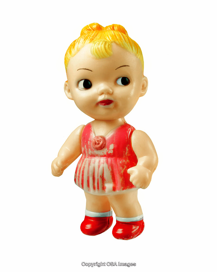 Vintage Plastic Doll Wearing Red Outfit with Yellow Hair and Unique Expression