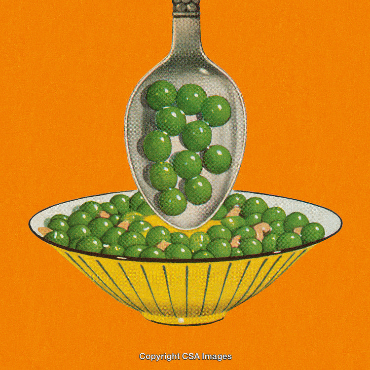 Spoon Overplate with Green Peas Against a Bright Orange Background