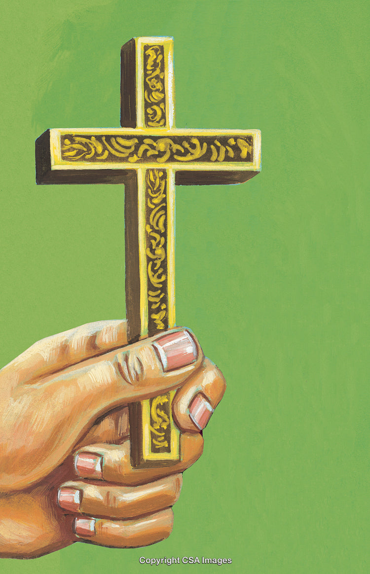 Hand Holding a Golden Decorative Cross With an Ornate Design on Green Background