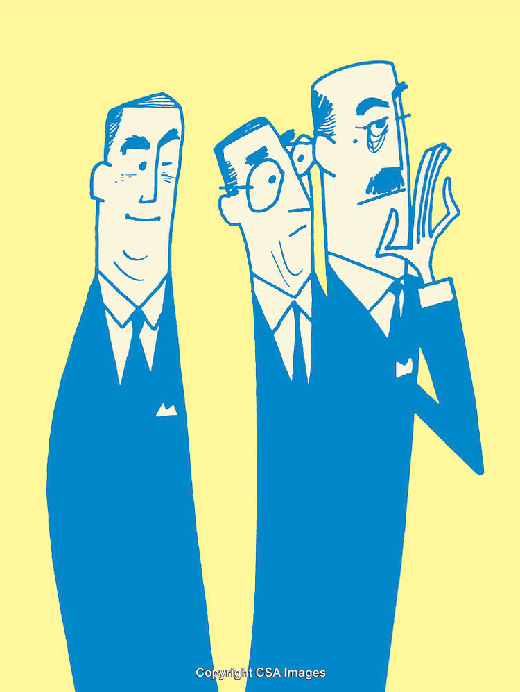 Group of Three Business Professionals Engaged in Confidential Discussion