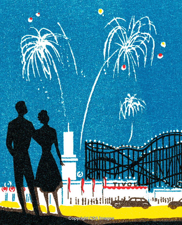 Romantic Couple Enjoying Fireworks Near Amusement Park at Night