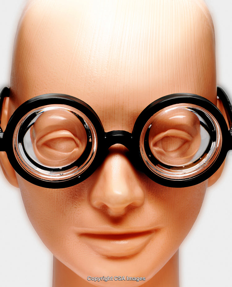 Close-Up of Toy Face Skin with Oversized Round Glasses
