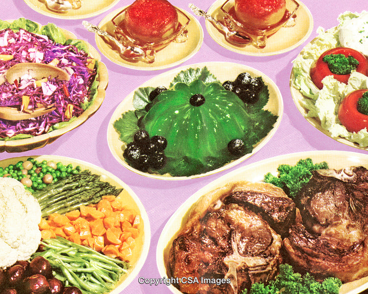 Vintage Styled Table Spread with Jell-O, Meat, and Salad Platters