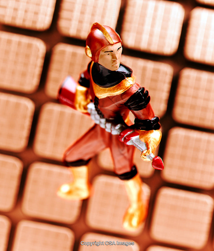 Action Figure In Futuristic Armor Posed Against Geometric Background