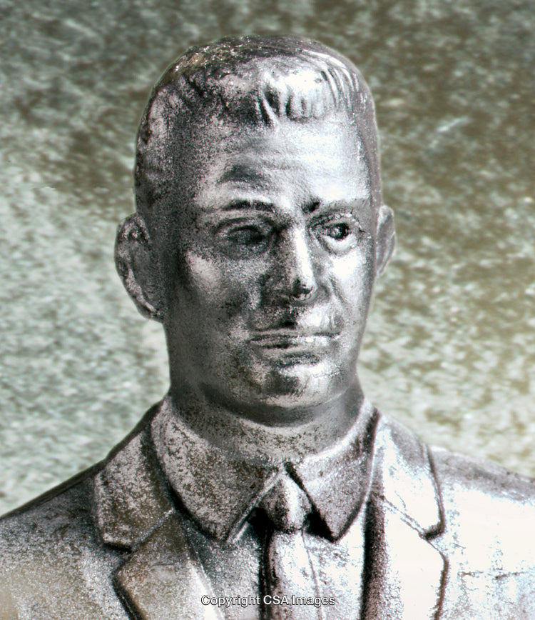 Close-Up of a Vintage Plastic Figurine Bust on a Textured Background