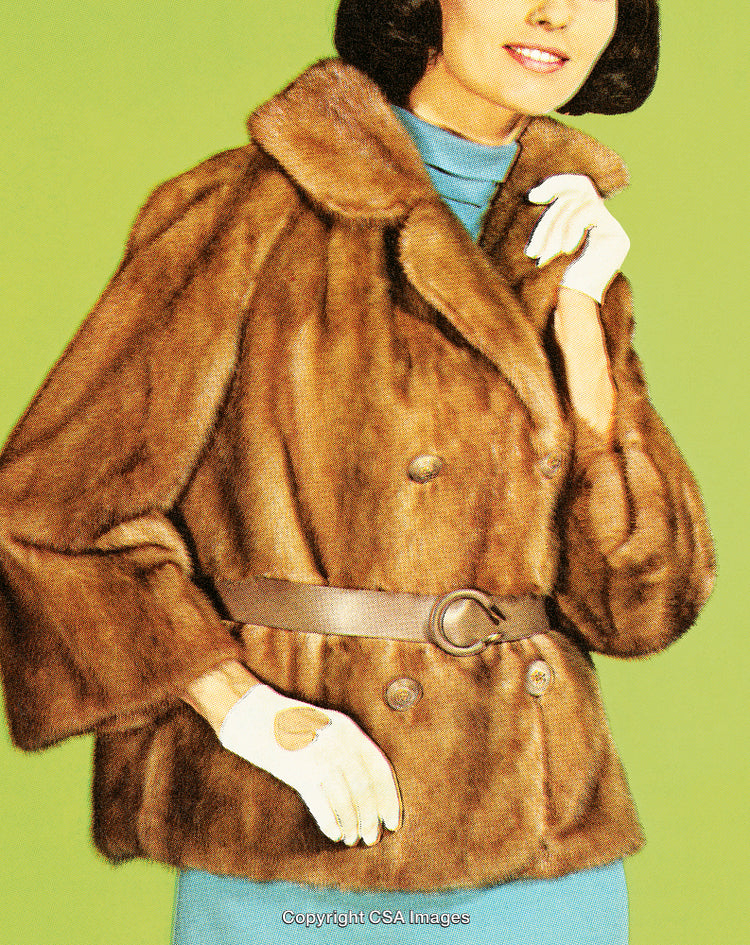 Vintage Styled Woman in a Fur Coat and Gloves on Green Background