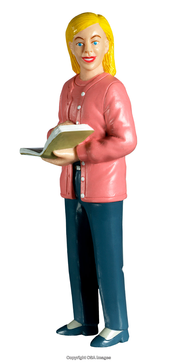 Plastic Figurine of a Smiling Woman with Book in Hand