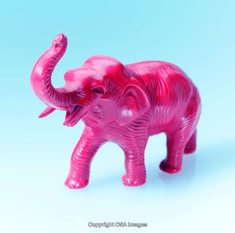 Pink Elephant Figurine Against a Vibrant Gradient Background