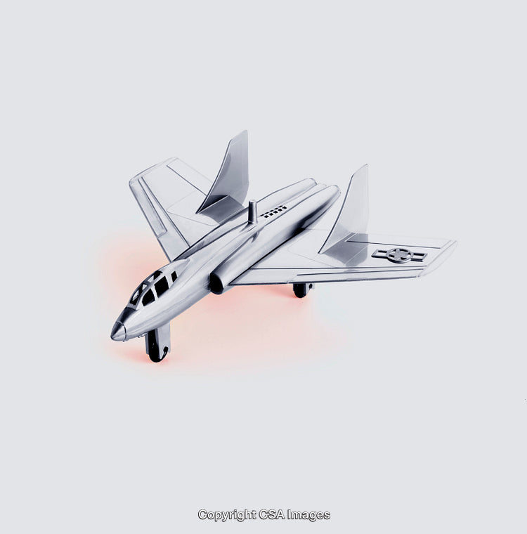 Metallic Toy Plane with Detailed Design Displayed on a White Background