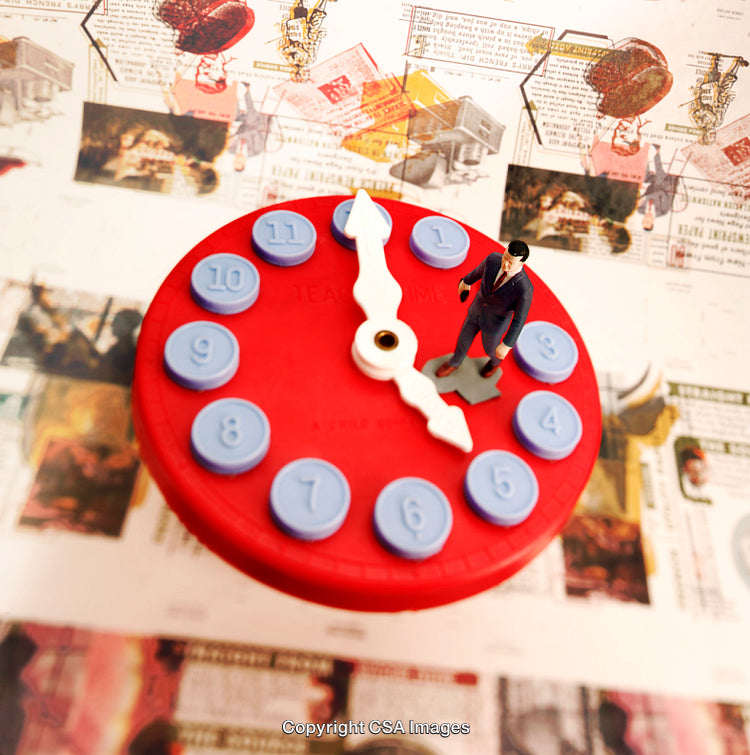 Miniature Figurine on Toy Clock With Background of Collage Elements