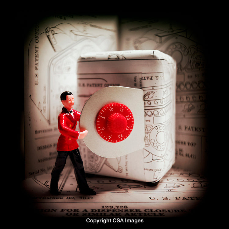 Close-Up of a Plastic Toy Figure with a Red Button Dial