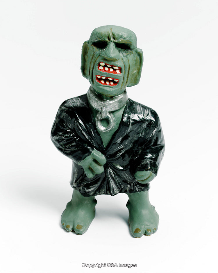 Green Figurine with Expressive Features and Unique Design in Vibrant Colors