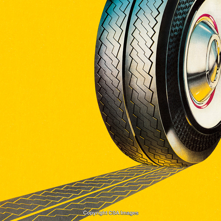 Close-Up of Car Tire with Yellow Background and Tread Pattern Reflections