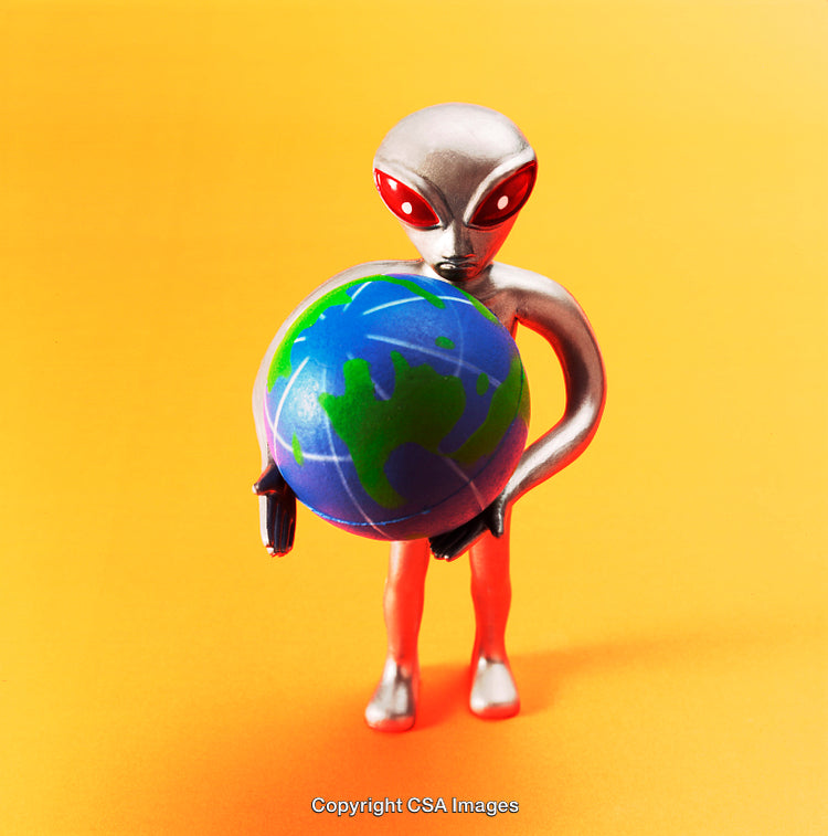 Silver Alien Figure Holding a Globe Against Vibrant Orange Background