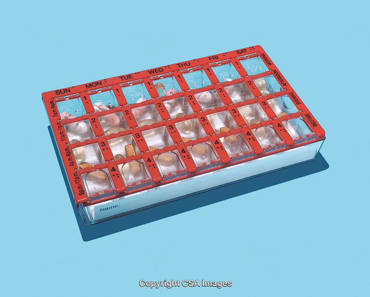 Weekly Pill Organizer Box Displayed on a Blue Background
