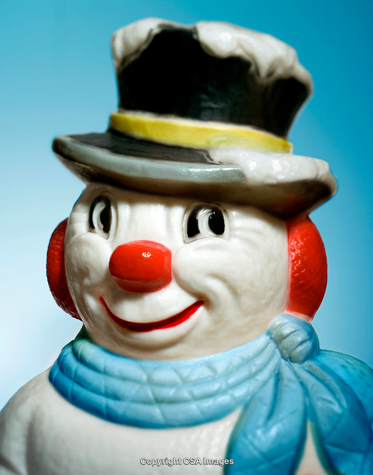 Close-Up of a Cheerful Snowman with Festive Accessories