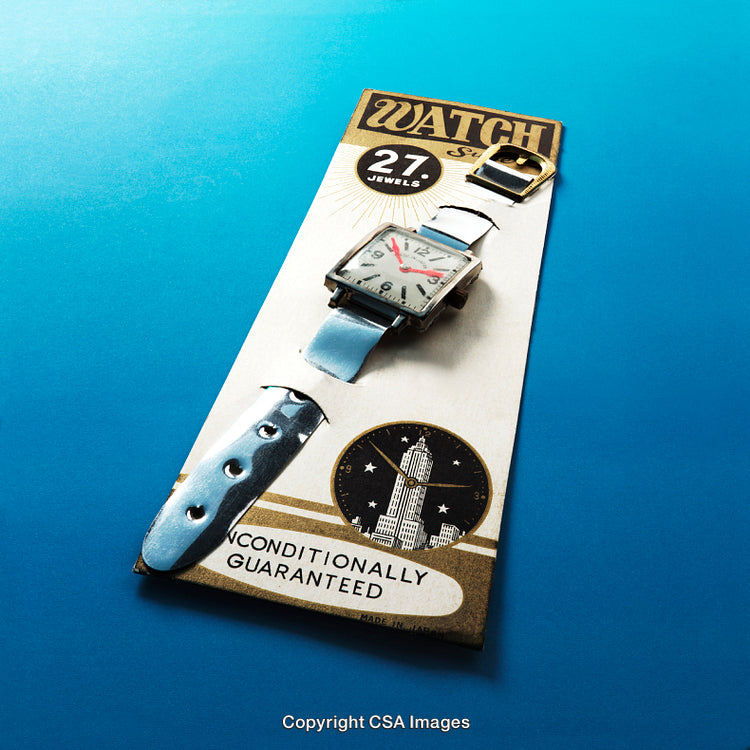 Vintage Carded Watch With Blue Band Against Gradient Background