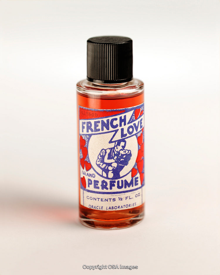 Vintage Perfume Bottle Featuring French Design and Vibrant Colors