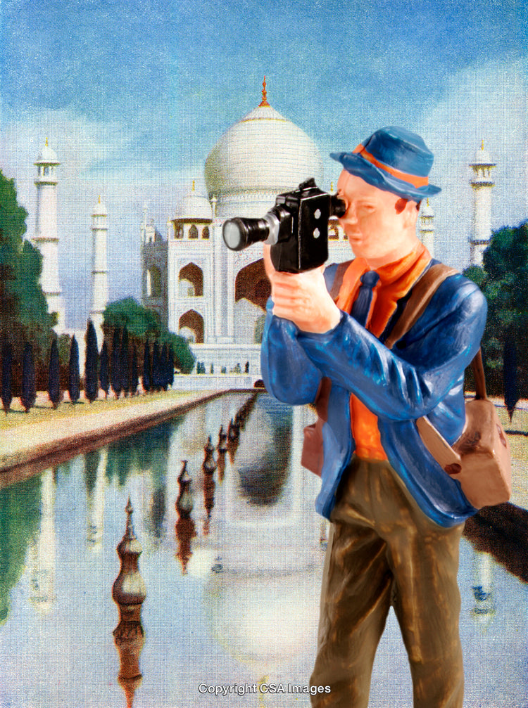 Traveler Figurine with Camera in Front of the Taj Mahal Backdrop