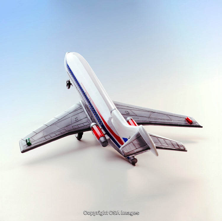 Model Airplane on Gradient Background Showcasing Detailed Features
