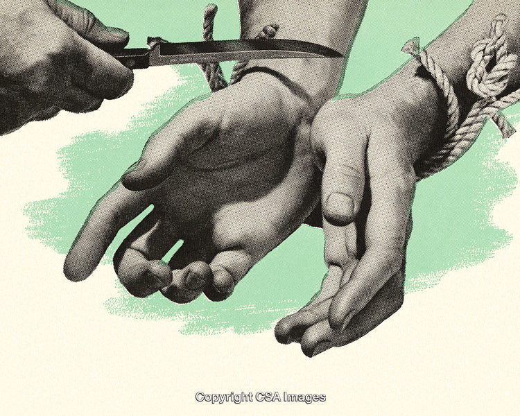 Hands Being Freed from Ropes Using a Knife in Symbolic Gesture