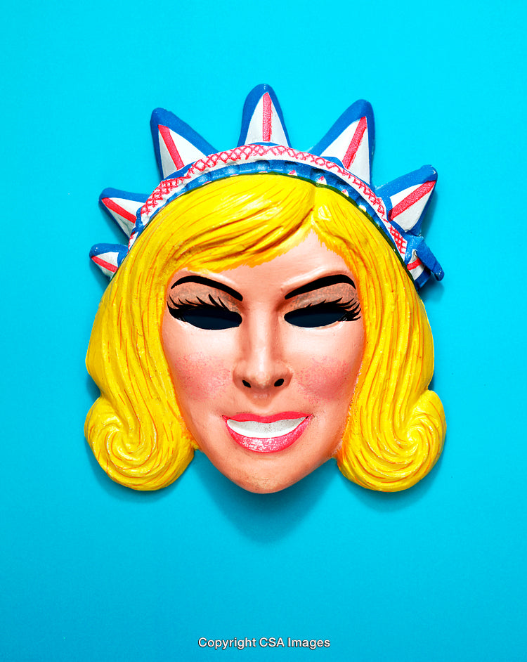 Colorful Plastic Mask with Retro Design on Bright Blue Background
