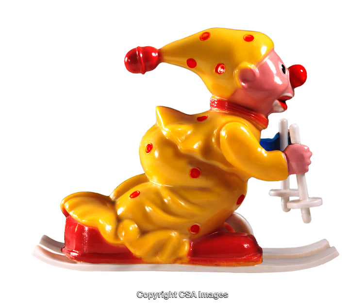 Colorful Plastic Clown Figurine Skiing in Yellow and Red Attire