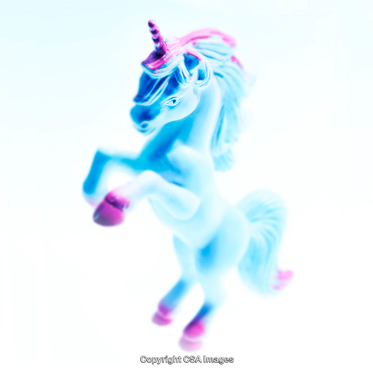 Dreamy Blue and Pink Unicorn Toy Figurine on a White Background